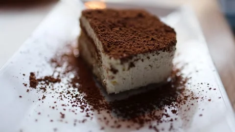 The video showcases a delectable souffl cake adorned with a luscious Stock Footage 265744870