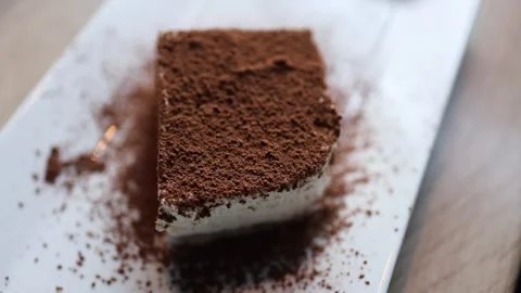 The video showcases a delectable souffl cake adorned Видео 266500955