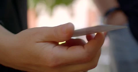 The video showcases individuals using financial tools for awareness Stock Footage 325640473