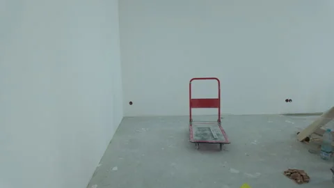 This video showcases the interior renovation phase with tools and materials in Stock Footage 325778616