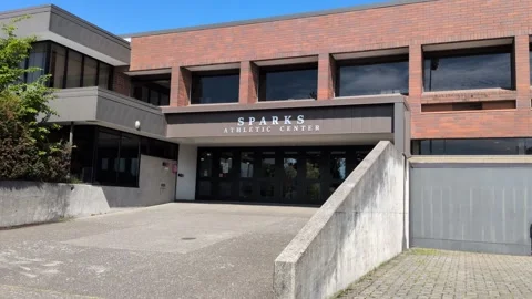 Video showcasing the modern Sparks Athletic Center with its glass façade Stock-Footage 336351630