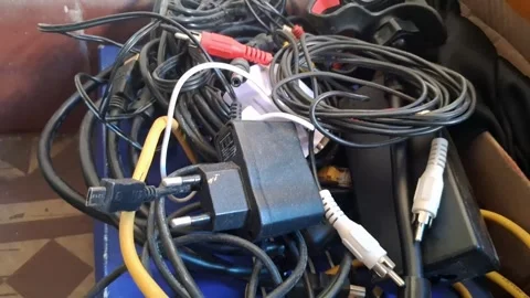 A video showcasing a tangled mess of electronic cables and wires Stock Footage 340169369