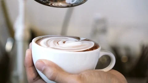 A video that showing how to make Latte Art. Tutorial of making art latte. Stock-Footage 334648336