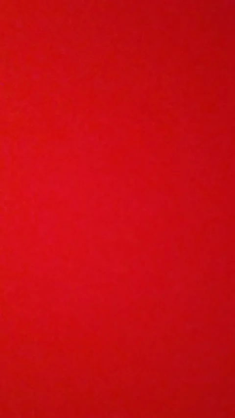 Video showing a red background Switch between dark and light tones. Video stock 272402253