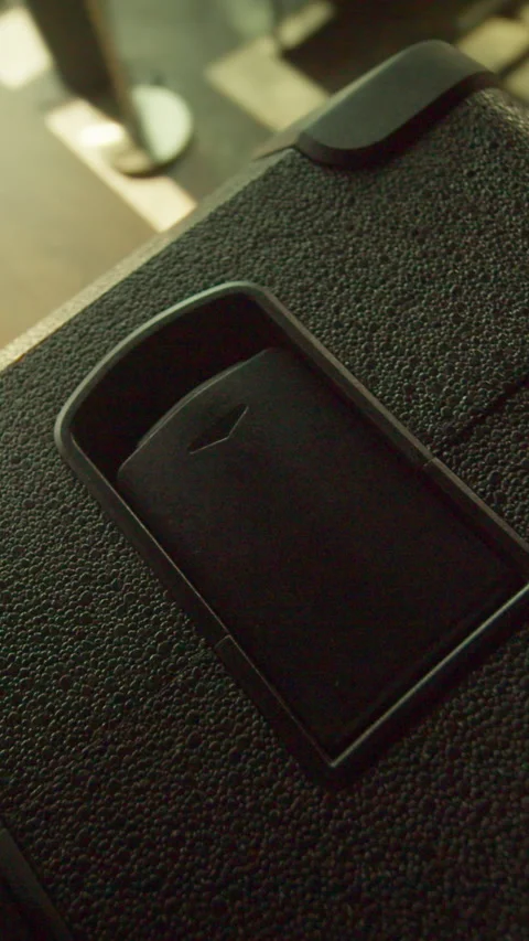 The video shows artistic black objects on a sleek surface Stock Footage 319600916