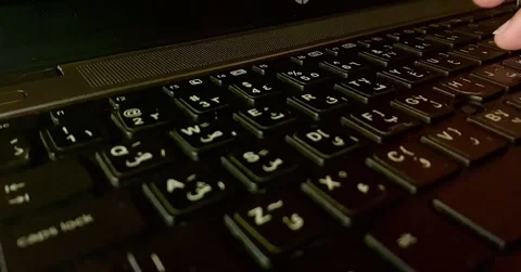 A video shows close up of typing on keyboard Stock Footage 316080944