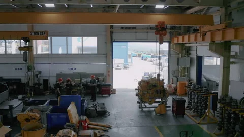 This video shows the interior of the plant, the disassembled engine and workers. Stock Footage 219930257