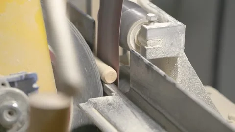 The video shows a woodworking process, where a spinning machine 스톡 동영상 300877147