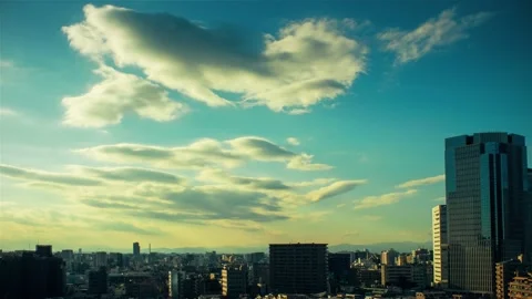 Video of sky, clouds, city and buildings, sunset Stock Footage 232819894