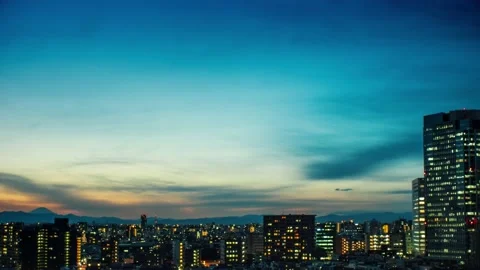Video of sky, clouds, city and buildings, night view from sunset Stock Footage 233881930