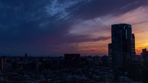 Video of sky, clouds, city and buildings, night view from sunset Stock Footage 242317045