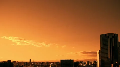 Video of the sky, clouds, towns and buildings, from daytime to sunset Stock Footage 233141421