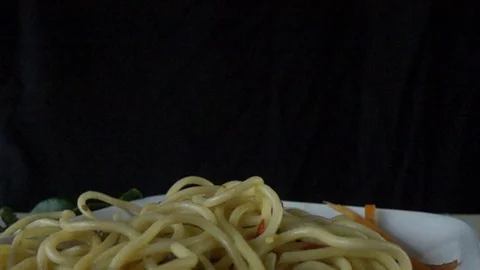 Video slow motion Spaghetti lines fall on the plate. Stock Footage 111991332