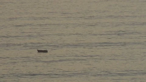 Video of the small boat in the waves of the sea (Pacific Ocean in Lima, Peru) Stock Footage 236273737