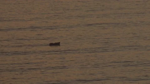 Video of the small boat in the waves of the sea (Pacific Ocean in Lima, Peru) Stock Footage 236273738