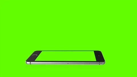 Video of Smartphone rotating, with green screen on background for chroma key. Stock Footage 70545851