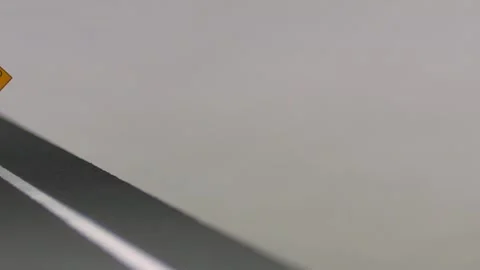 Video of a smashed, abandoned, light blue, retro car figurine left in the mid Stock Footage 133490780