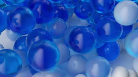 Video of solid white balls turning into blue glass balls and flying away. Stock Footage 295923529