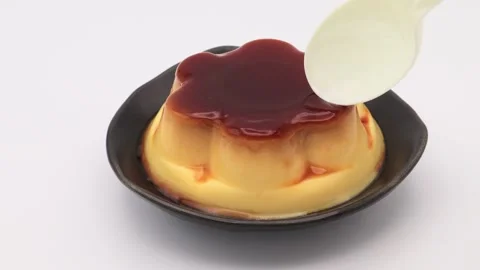 A video of someone eating pudding Video stock 336619250