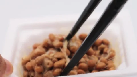 A video of someone mixing natto. Stock Footage 336583271