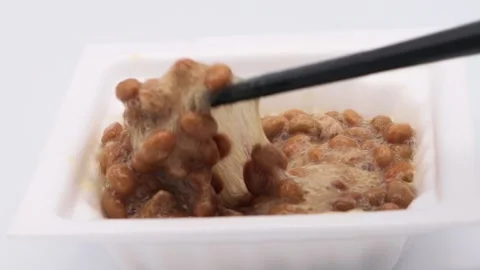 A video of someone mixing natto. Stock Footage 336584200