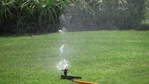 Video of sprinkler in real slow motion Stock Footage 80055085
