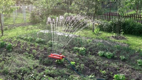 Video of sprinkler in real slow motion Stock Footage 83650436