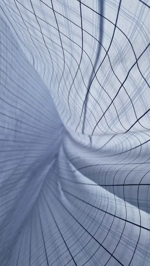 Video of strong wind blowing check patterned bed sheets on a clothesline. Stock Footage 318728035