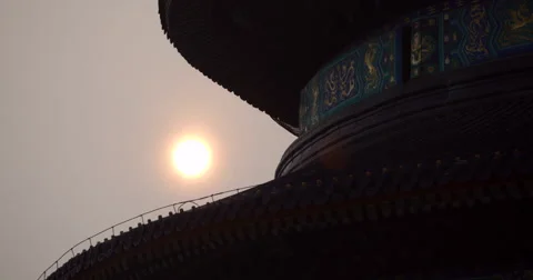  video of the sun setting over The Temple of Heaven in Beijing, China Stock Footage 52533993