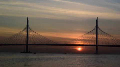 Video of the sunset against the background of the cable-stayed bridge Stock Footage 158060416