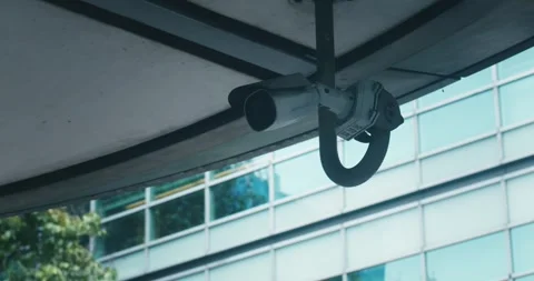 Video surveillance camera system installed on city streets. Cctv camera security Stock Footage 250590566