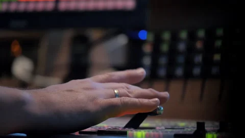 Video Switcher, Director of Broadcast Controls Video Mixer, Close-up of hand Stock Footage 134038612