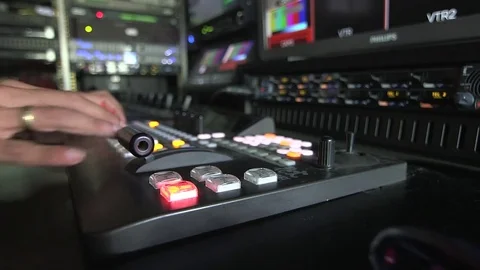 Video switcher operating in broadcasting van Stock Footage 69872002