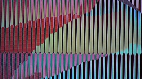 Video synthesizer feedback with thin vertical stripes. Stock Footage 314926665