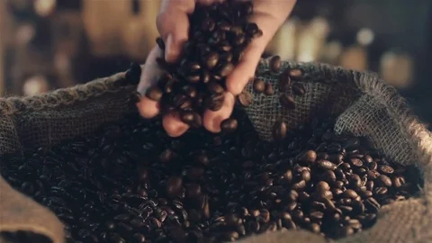 Video of taking coffee beans in real slow motion Stock Footage 78630716