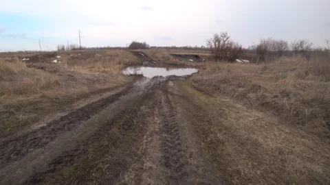 Video through an off-road car windshield from inside the car. Driving old Stock Footage 111788159