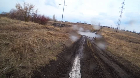 Video through an off-road car windshield from inside the car. Driving old Stock Footage 111788186