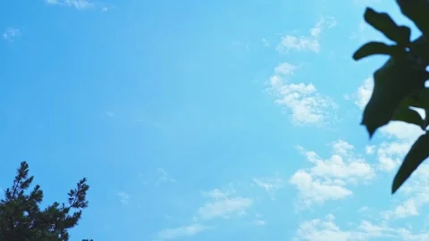 Video time lapse of movement of white clouds against background of blue sky.. Stock Footage 338238314