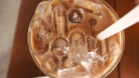 Video top view ice coffee on the table background, Stock Footage 111990791