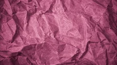 Wrinkle pink paper texture in rotation, Stock Video