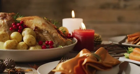 Video of tray with roasted turkey and diverse dishes on wooden surface 스톡 동영상 331245802