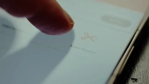 Video Trimmer function with scissors icon within an application for editing Stock Footage 326945117