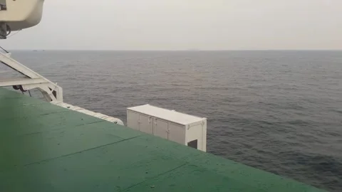 Video of a trip by ship in the middle of Indonesian waters in the morning Stock Footage 324349960