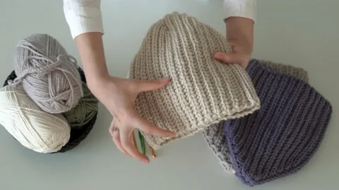 Video tutorial about how to crochet woolen clothes Stock Footage 199591937