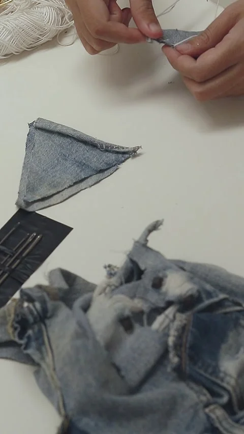 A video tutorial of sewing old denim into DIY creative Christmas ornament Video stock 294921342