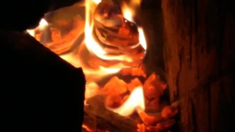 Video for TV background with fire in a fireplace in a warm room. Stock Footage 201813818