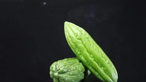 Video of two bitter melons rotating in detail Stock Footage 280862113