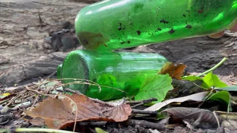 Video of two green bottles breaking Stock Footage 252355153