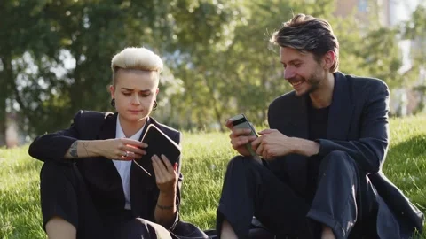 Video of two intern business workers young students man with girlfriend share Stock Footage 251377475