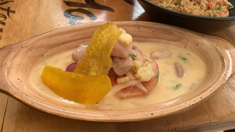 Video of typical Peruvian dish "Leche de Tigre", traditional Peruvian food. Stock Footage 252589600